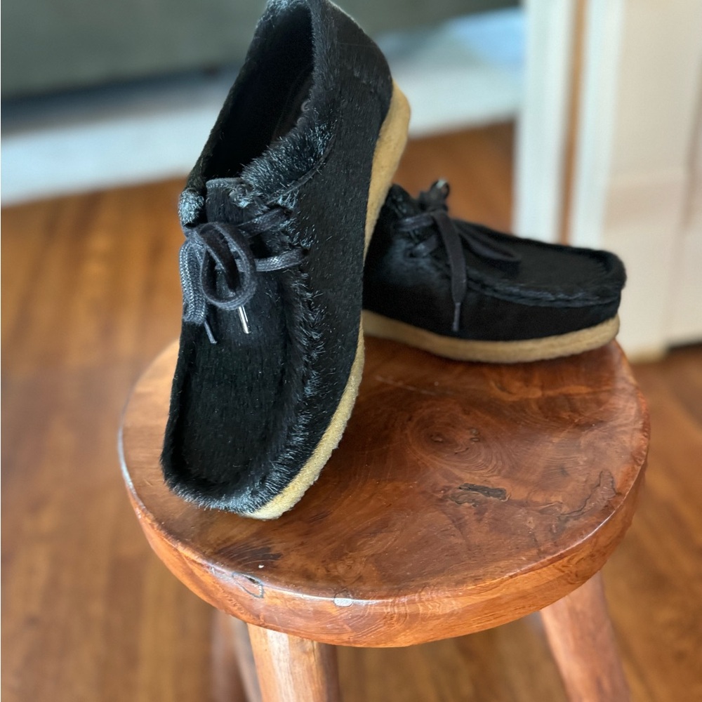 Clarks Black Faux-Fur Moccasins with Tan Crepe Sole